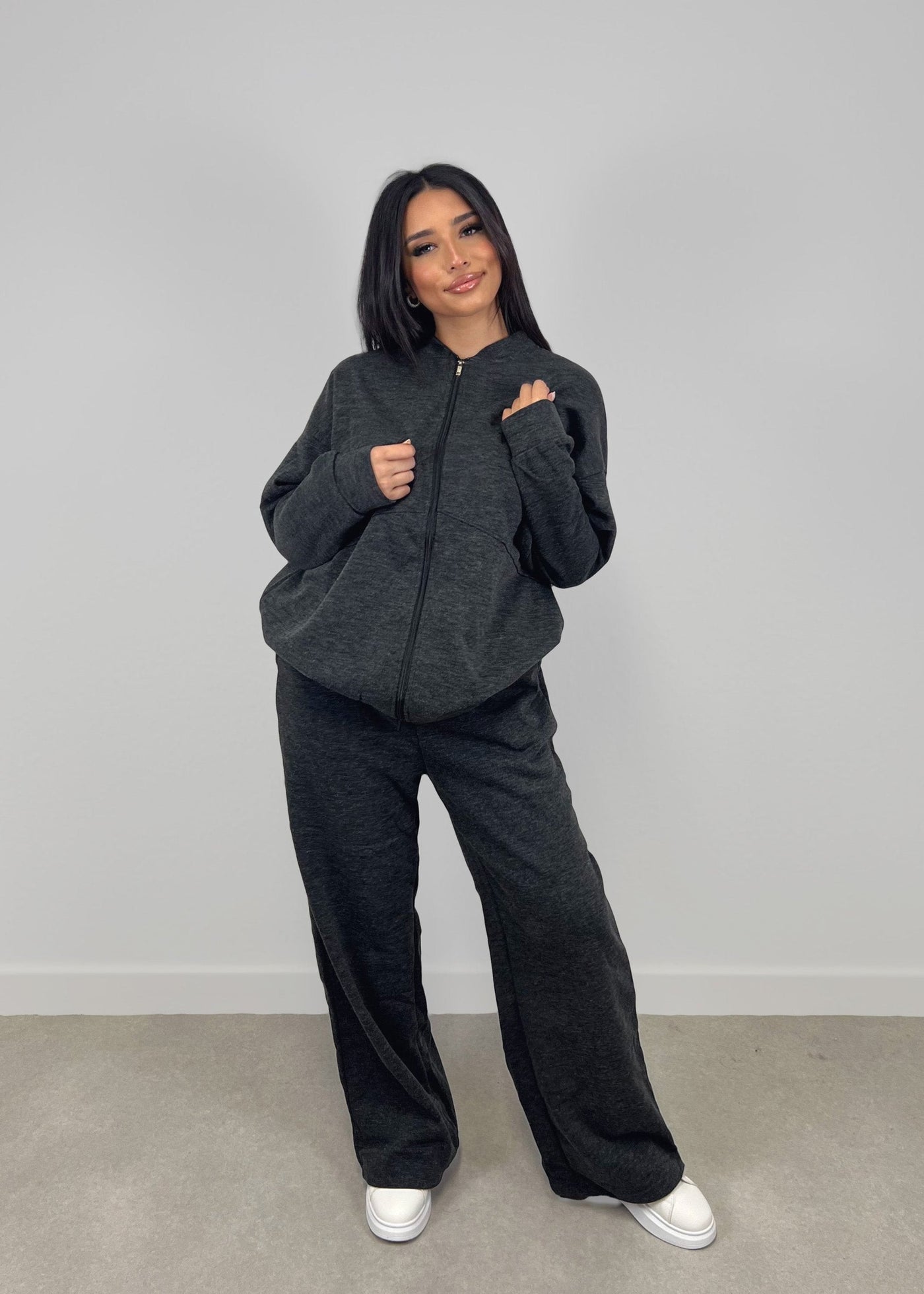 Lounge-Set mit Reißverschlussjacke und weiten Hosen Schwarz
