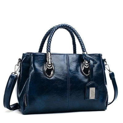 Giana | Elegante Lederhandtasche mit geflochtenem Griff