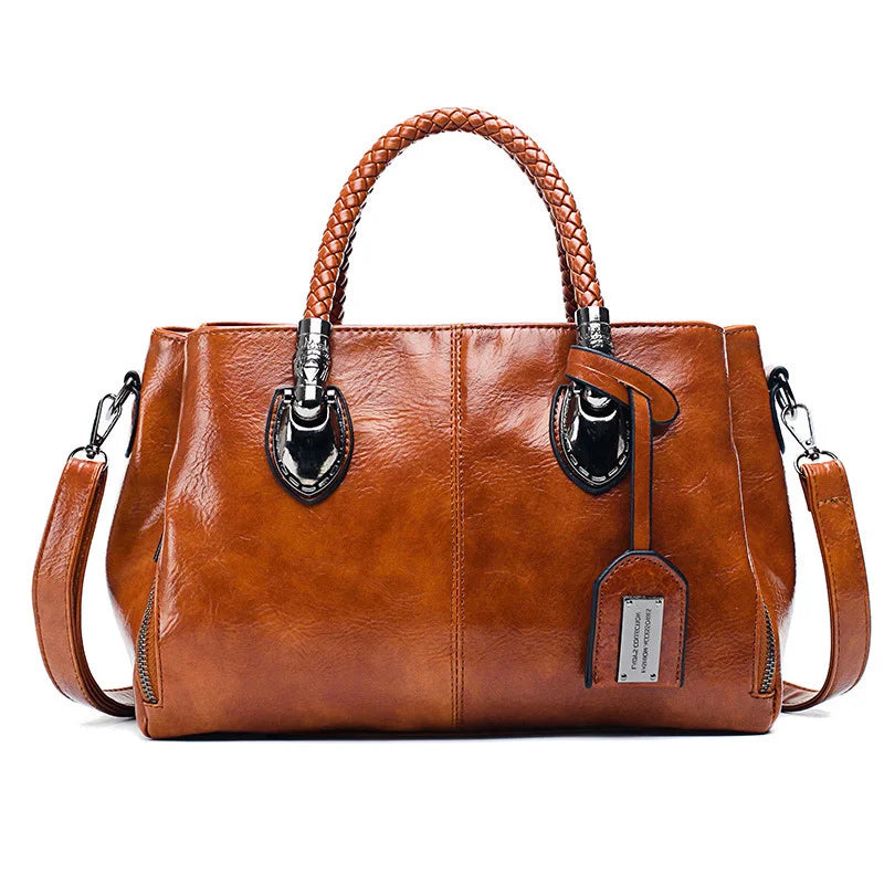 Giana | Elegante Lederhandtasche mit geflochtenem Griff