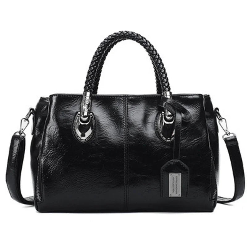Giana | Elegante Lederhandtasche mit geflochtenem Griff