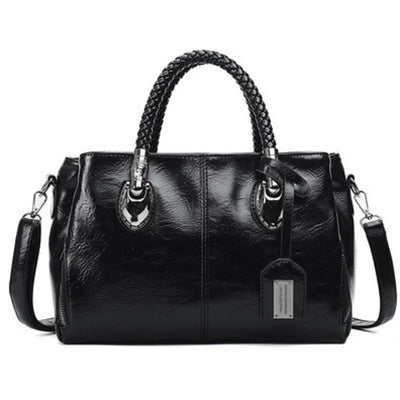 Giana | Elegante Lederhandtasche mit geflochtenem Griff