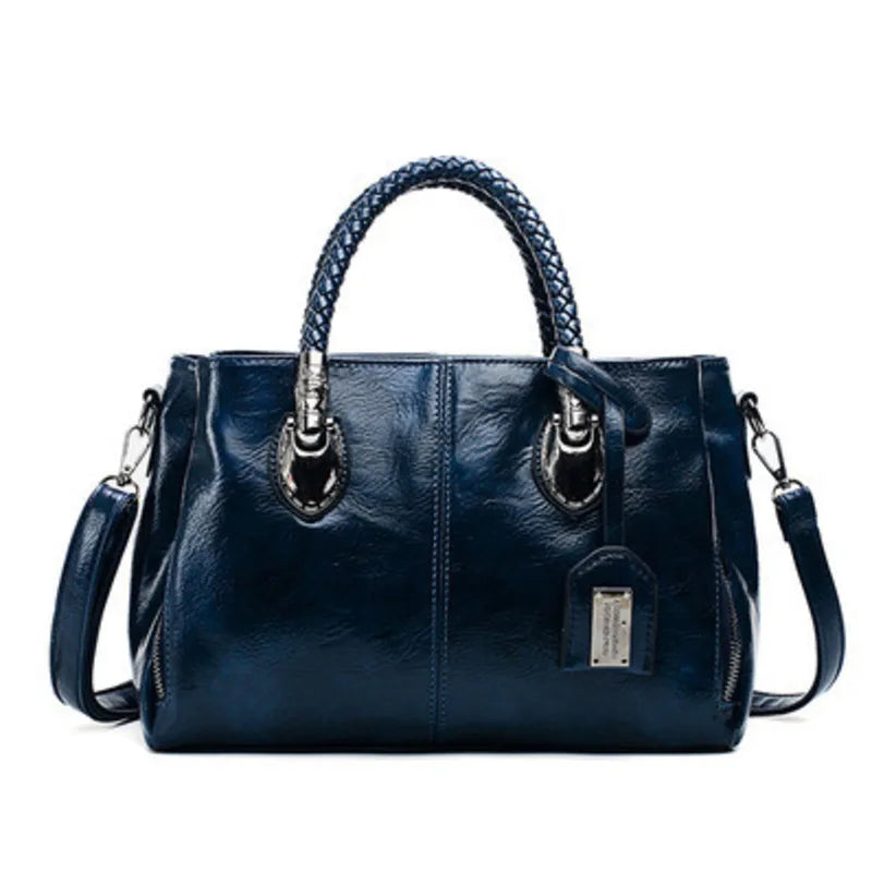Giana | Elegante Lederhandtasche mit geflochtenem Griff